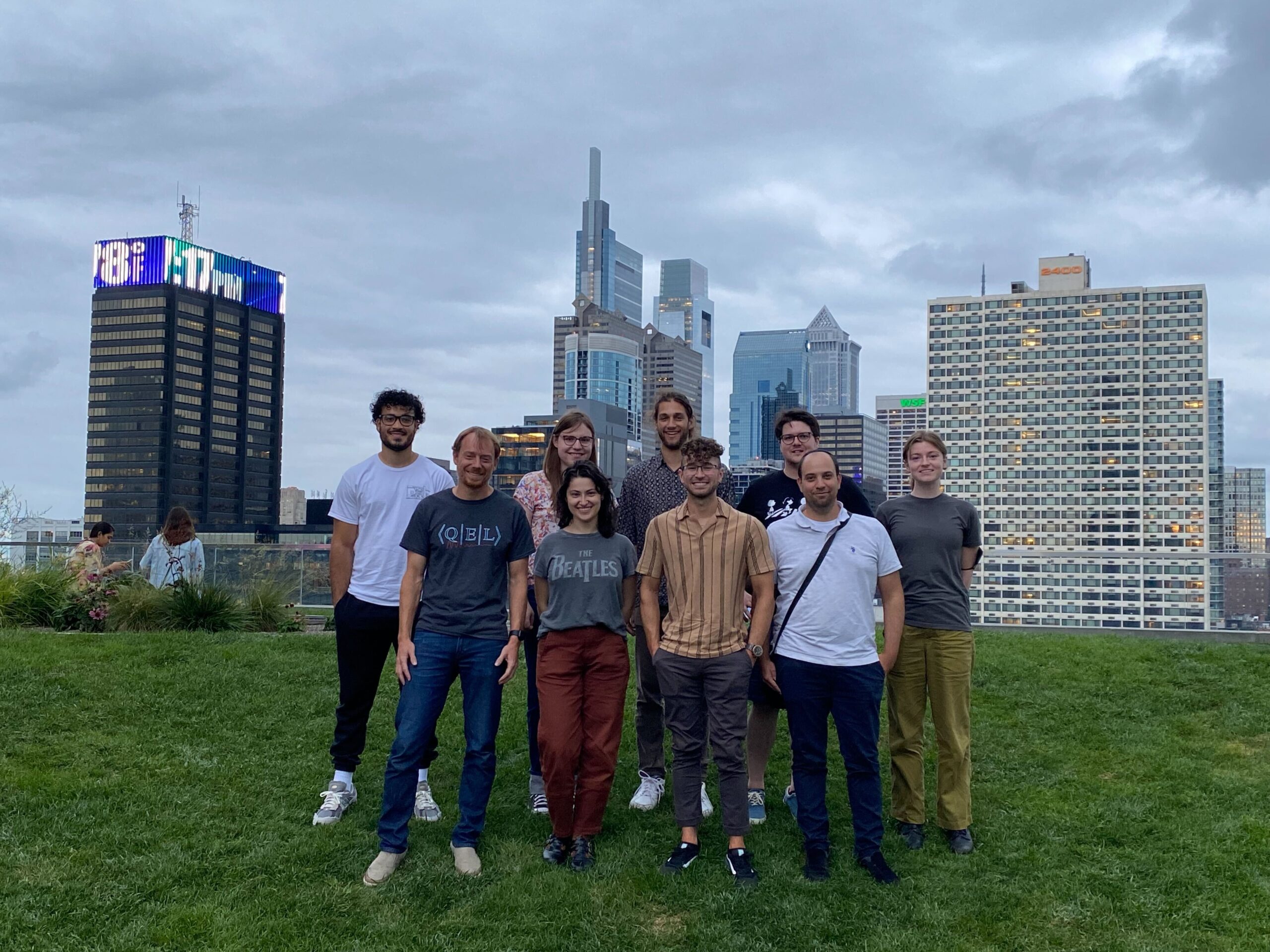 Group photo in front of Philly skyline, Fall 2023